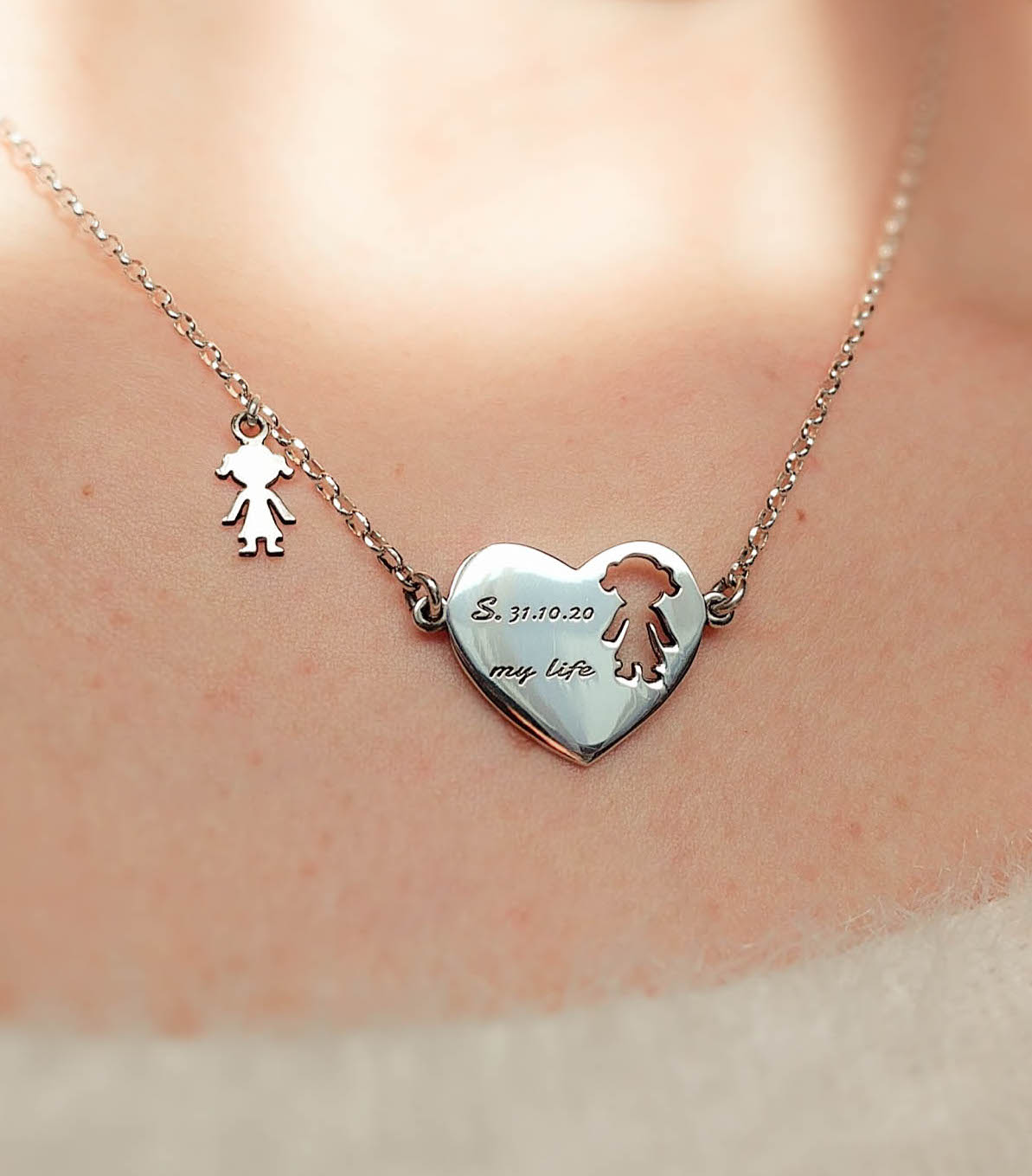 Vendita online collana in argento con cuore e bimba